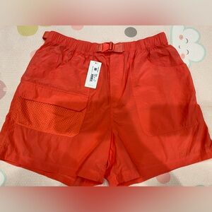 NWT Outdoor Voices RecNylon 4” shorts in Hot Coral. Pockets galore!!